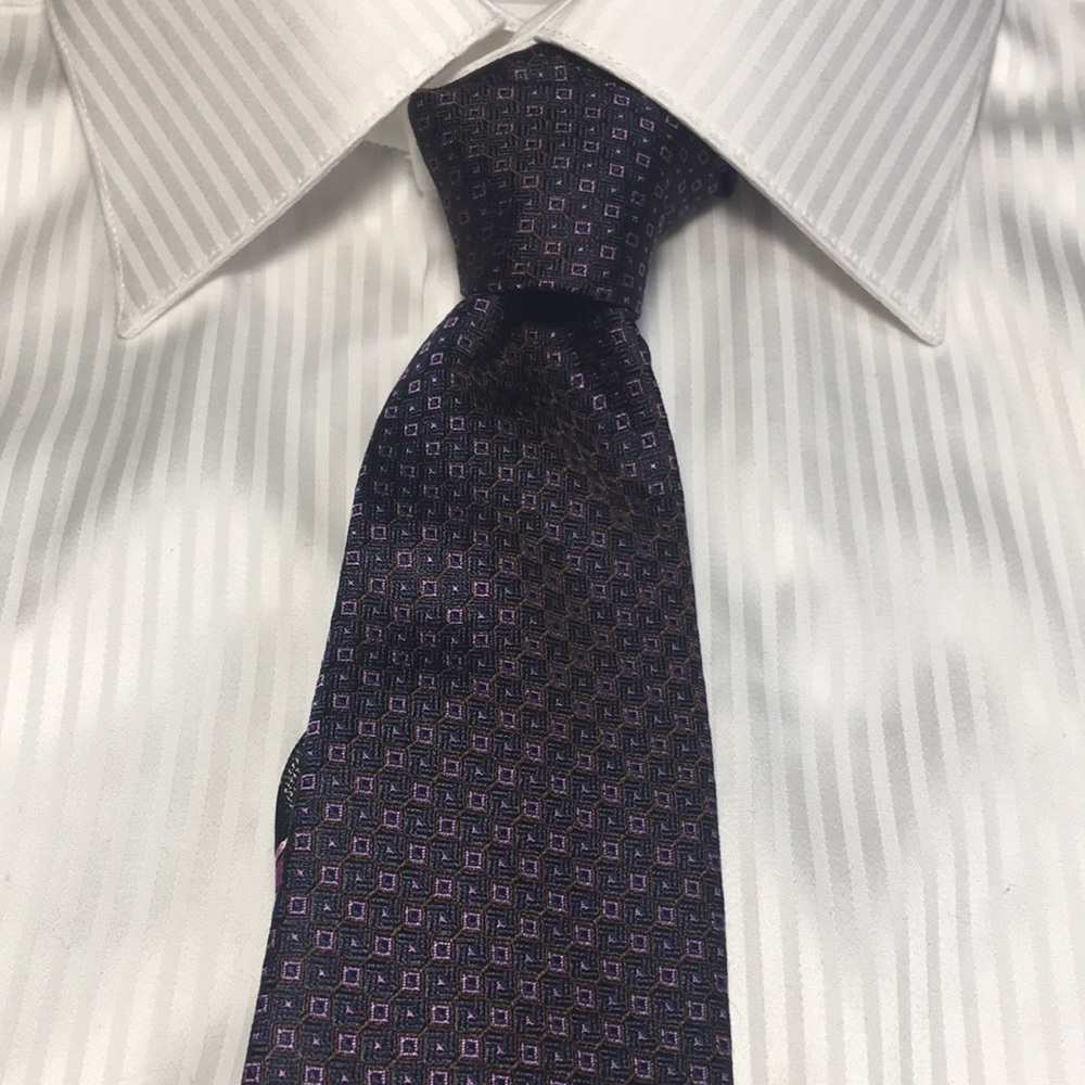 Haggar 1926- purple and black square pattern w striped tail. 100% silk tie.